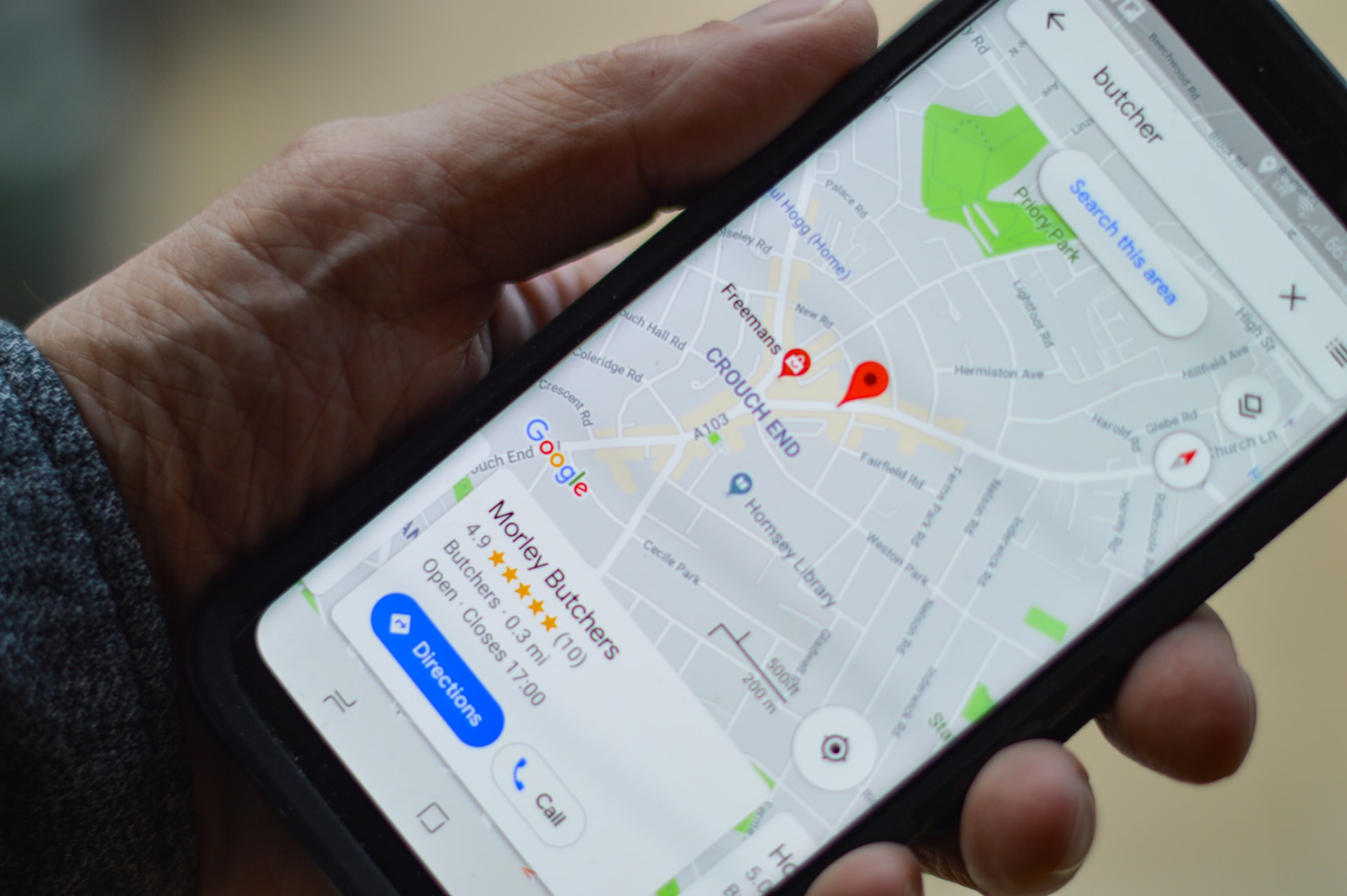 Google Maps on Mobile Phone in Hand